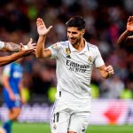 Jugadores del Real Madrid celebran el tanto de Marco Asensio ante el Getafe