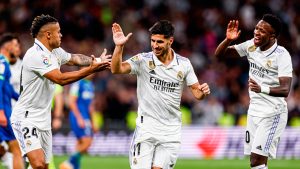 Jugadores del Real Madrid celebran el tanto de Marco Asensio ante el Getafe