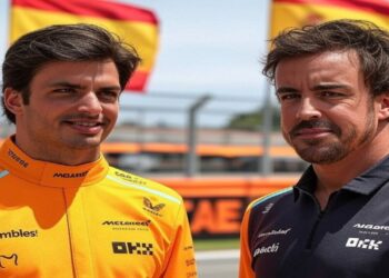 Dos pilotos españoles comparten momento en el paddock