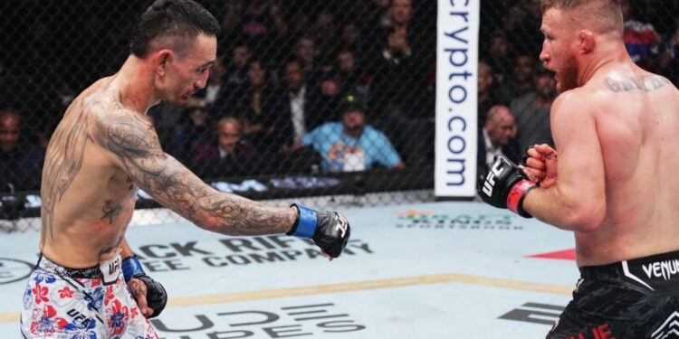 Holloway sobre apuntar al suelo con Conor