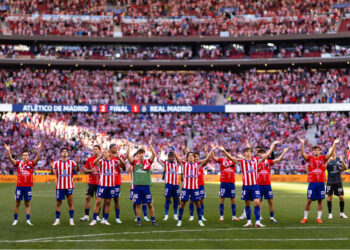 La plantilla del Atlético de Madrid celebrando la victoria frente al Real Madrid / Fuente: Atlético de Madrid